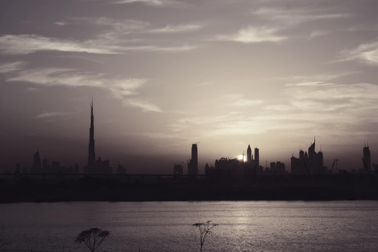 The Dubai skyline at sunset with the Burj Khalifa