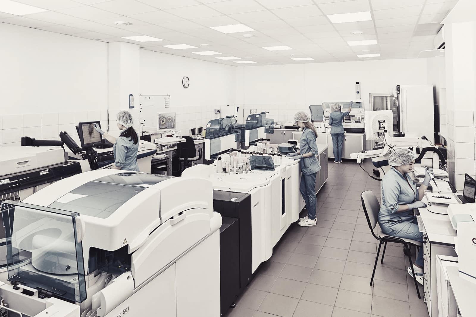 Scientists working with equipment in a laboratory