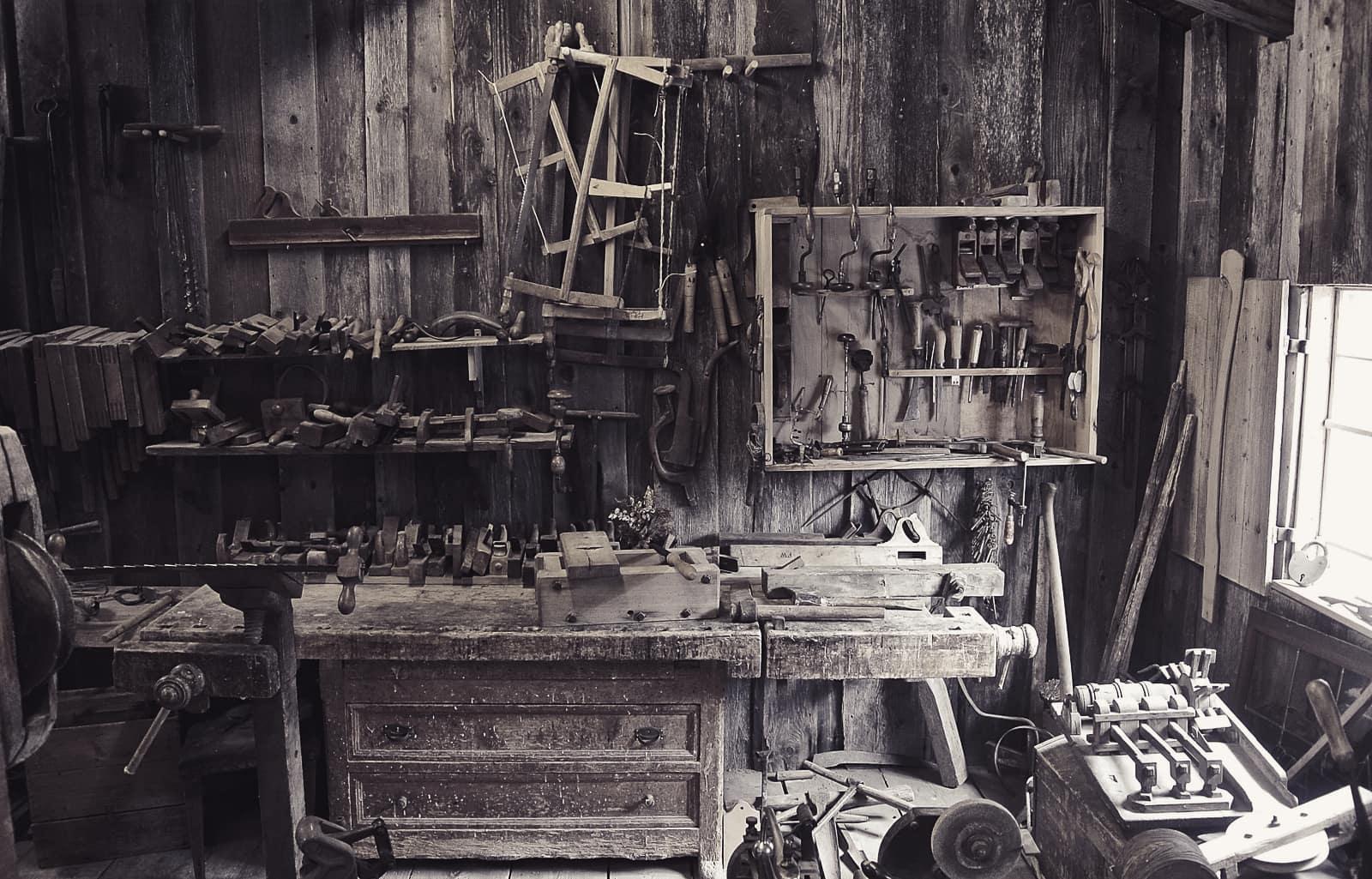 A woodworking workshop with tools and workbenches
